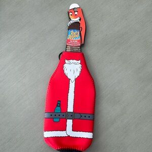 Travis Mathew party popper Santa bottle opener and beverage insulator
